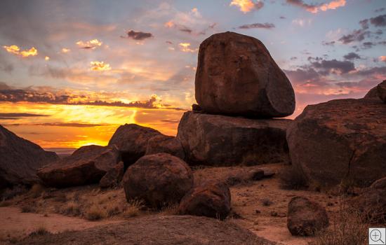 dramatic sunset with rocks and boulders, Fishriver Camp